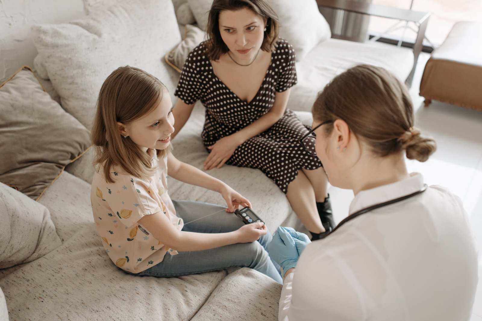 a doctor checking a child