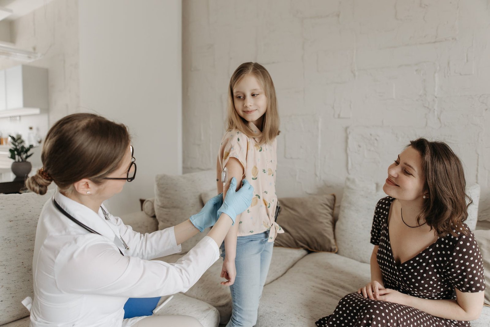 a doctor checking a child