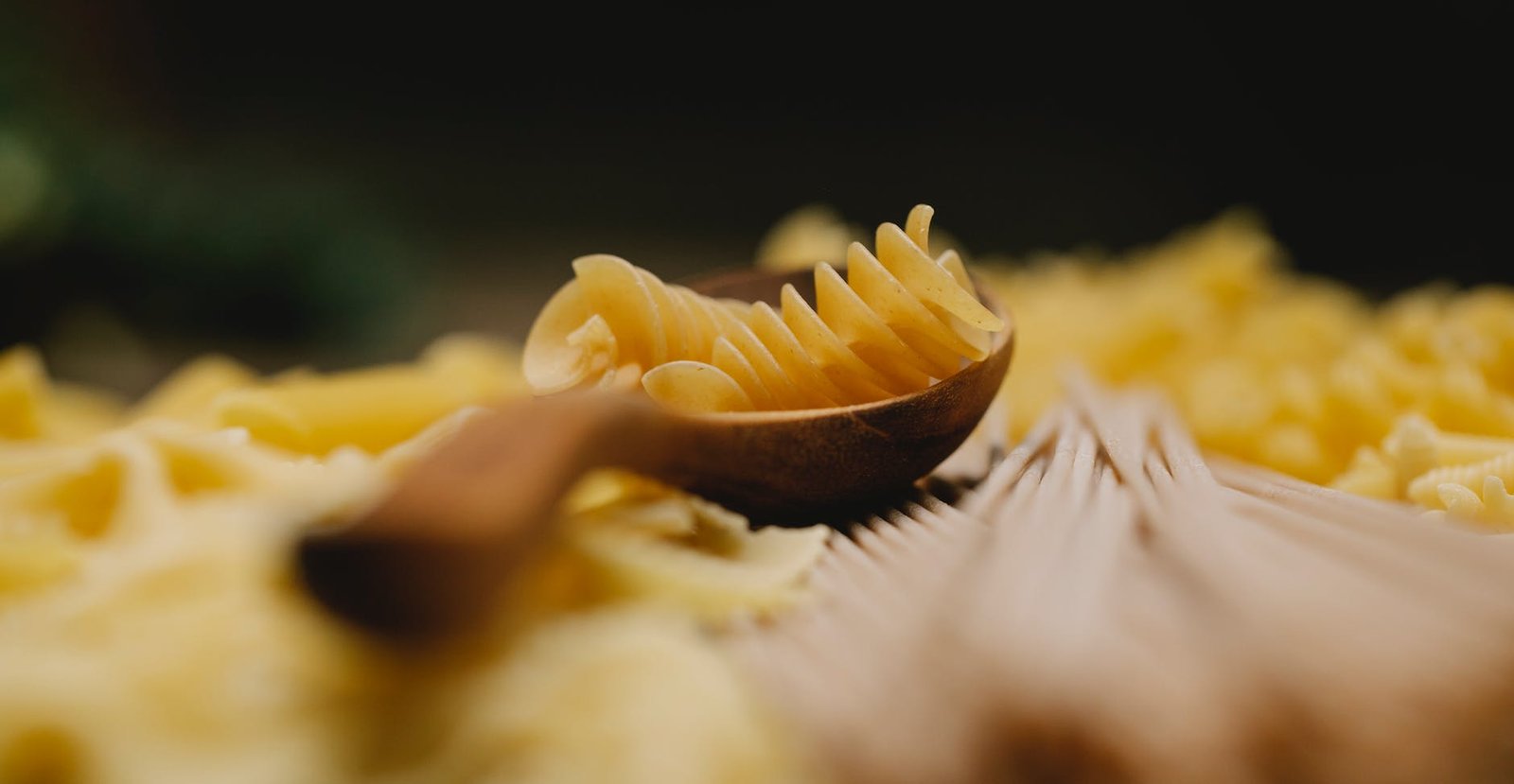 fusilli among pasta prepared for cooking