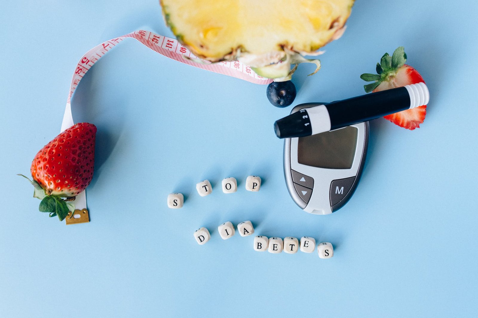 lancet pen beside the fruits