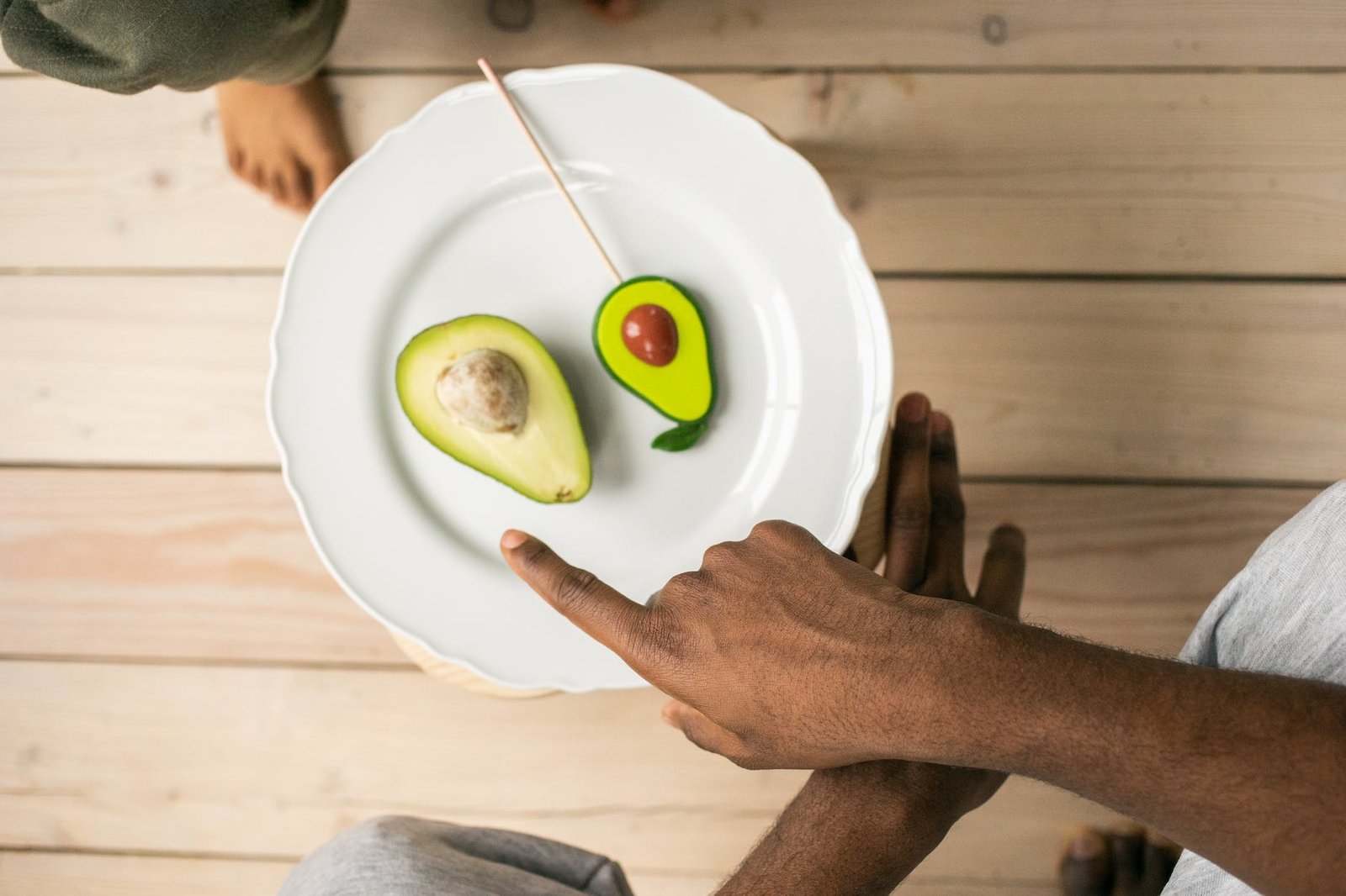 black father picking healthy food for child